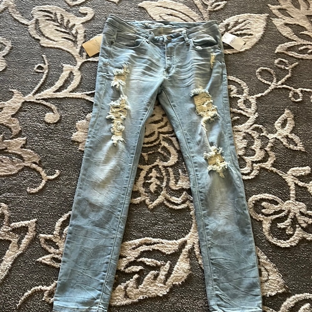 Light blue ripped skinny jeans